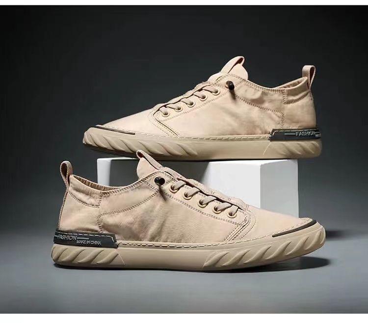 Baskets décontractées en toile pour hommes, confortables et polyvalentes, respirantes, chaussures de sport plates, légères, pour la marche en extérieur, design moderne.