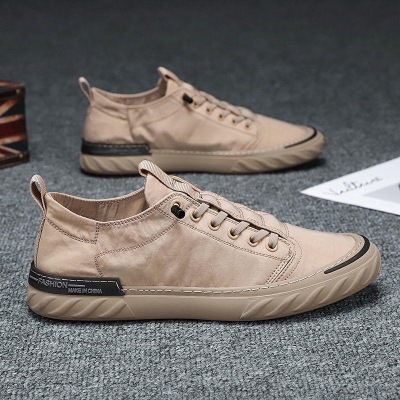Baskets décontractées en toile pour hommes, confortables et polyvalentes, respirantes, chaussures de sport plates, légères, pour la marche en extérieur, design moderne.