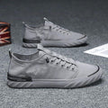 Baskets décontractées en toile pour hommes, confortables et polyvalentes, respirantes, chaussures de sport plates, légères, pour la marche en extérieur, design moderne.