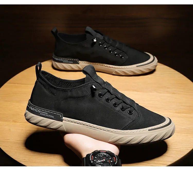Baskets décontractées en toile pour hommes, confortables et polyvalentes, respirantes, chaussures de sport plates, légères, pour la marche en extérieur, design moderne.