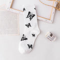 Chaussettes de dessin animé mignon nœud imprimé blanc noir calcetines Chaussettes fantaisie pour femme Ras du cou Amusantes Originales mode automne Chaussettes habillées en coton décontractées