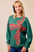 Pull en polaire de Noël BiBi avec nœud en ruban écossais