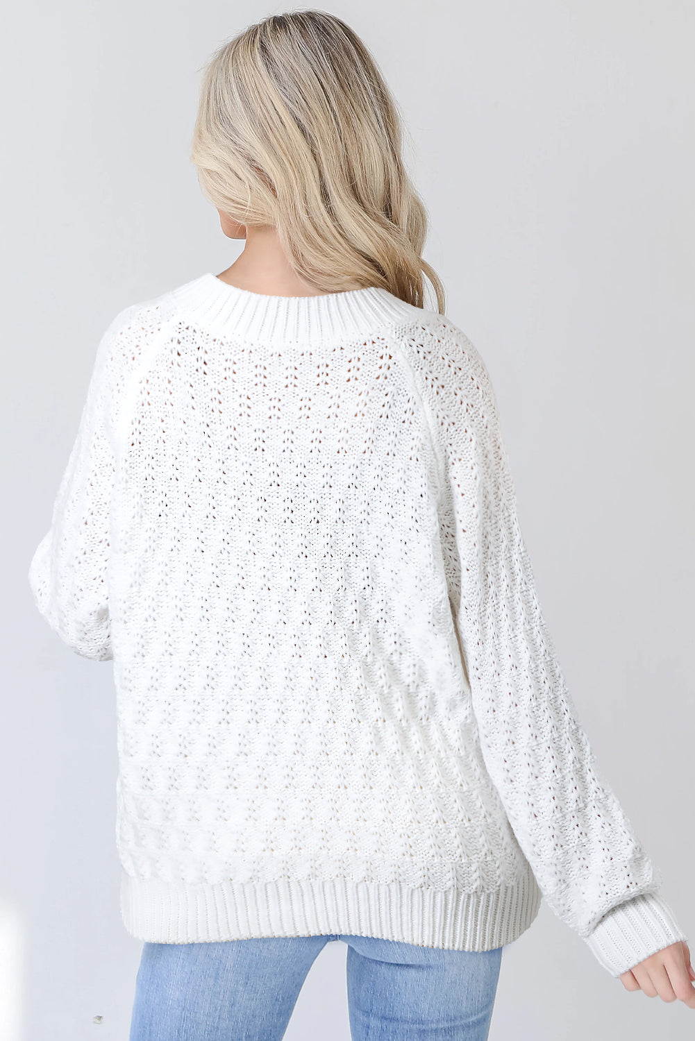 Pull ample en tricot blanc uni à bord côtelé et col en V - Femstylo