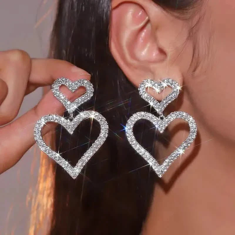 Boucles d'oreilles clous chic doubles cœurs en strass