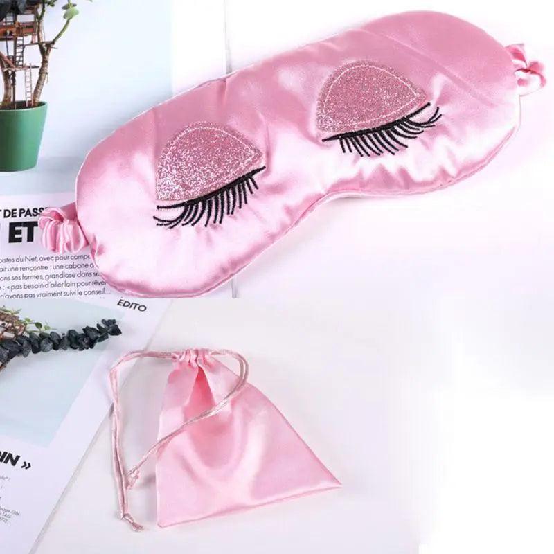 Masque de sommeil élégant en soie rose confortable, masque de sommeil pour les yeux avec longs cils, masque de sommeil doux avec sangle élastique, bandeau léger et respirant pour femme avec pochette de luxe.