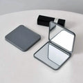 Miroir de poche compact pliable pour les voyages et les retouches