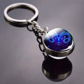 Porte-clés boule de verre cabochon double face Constellation