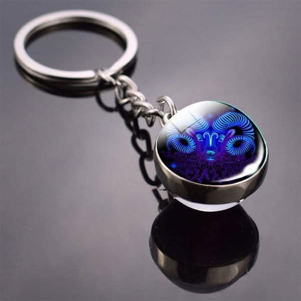 Porte-clés boule de verre cabochon double face Constellation