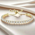 Bracelet de tennis réglable pour femme, avec base en cuivre, finition plaquée et incrustation en zircone cubique synthétique