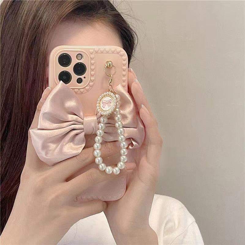 Mignonne Coque de Téléphone Élegante Anti-chute en Perles et Nœud 3D pour iPhone 11 12 13 Pro Max 7 8 Plus Xr X Xs Se, Coque de Téléphone Idéale avec Chaîne de Perles et Nœud pour iPhone