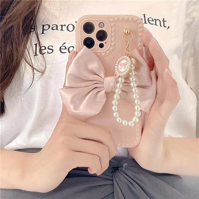Mignonne Coque de Téléphone Élegante Anti-chute en Perles et Nœud 3D pour iPhone 11 12 13 Pro Max 7 8 Plus Xr X Xs Se, Coque de Téléphone Idéale avec Chaîne de Perles et Nœud pour iPhone