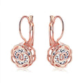 Boucles d'oreilles pendantes à levier en cristal et fleurs dorées