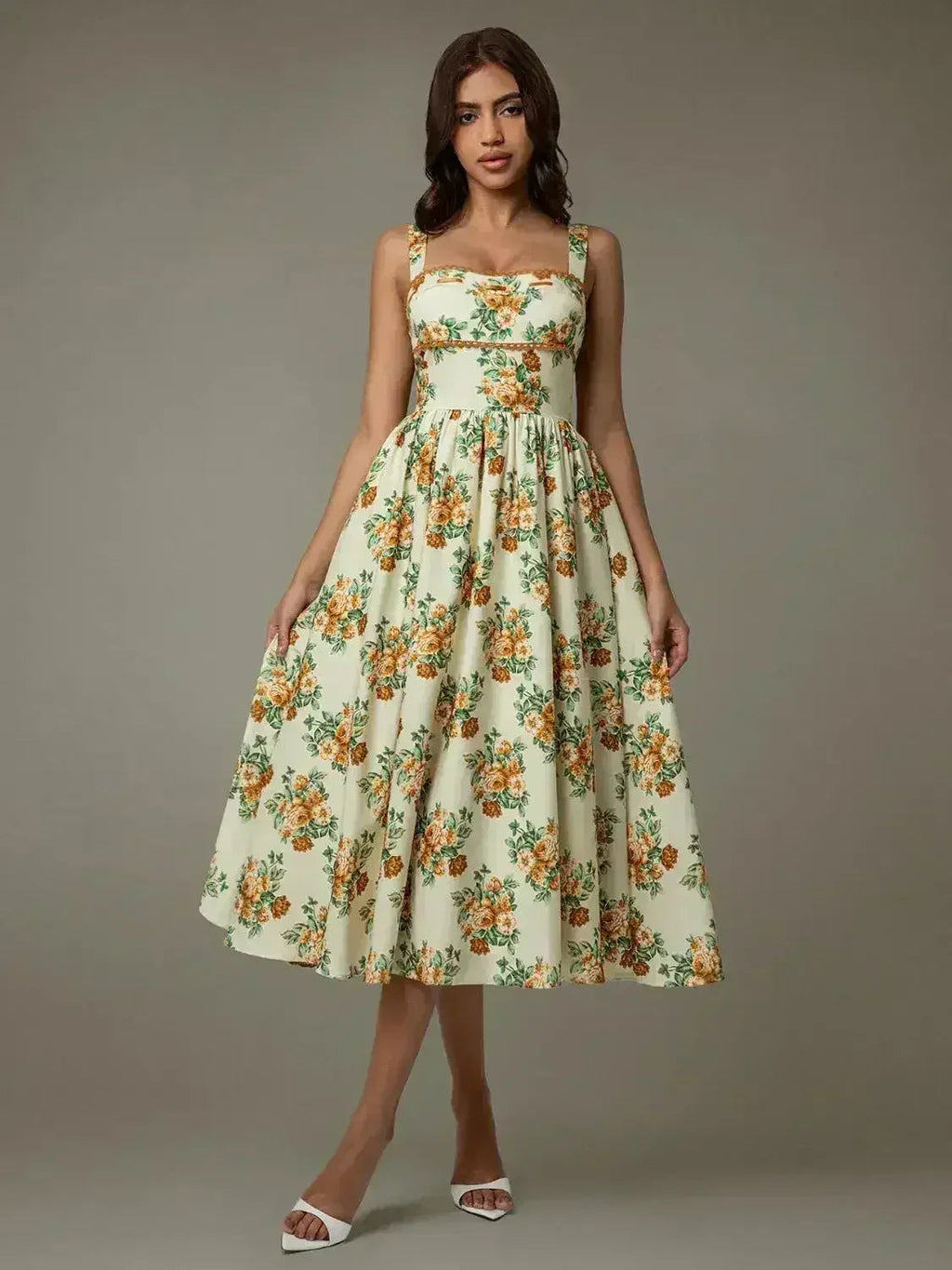 Robe midi florale sans manches bordée de dentelle