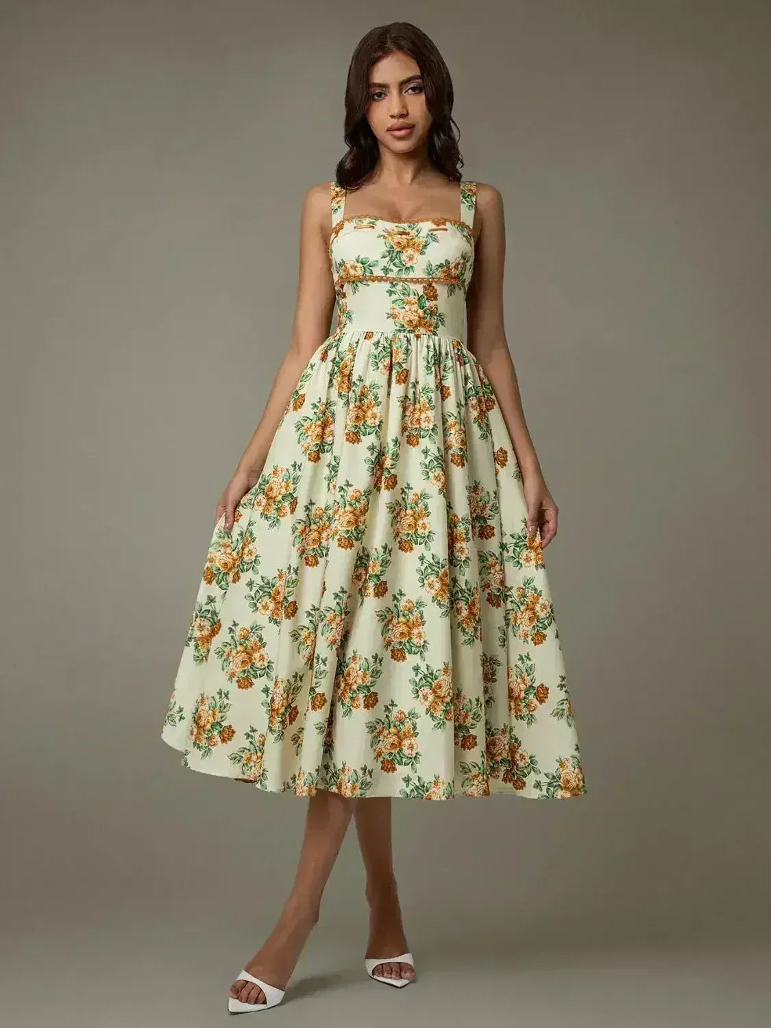 Robe midi florale sans manches bordée de dentelle