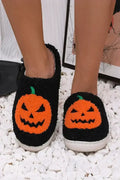 Pantoufles en peluche noires à imprimé citrouille d'Halloween