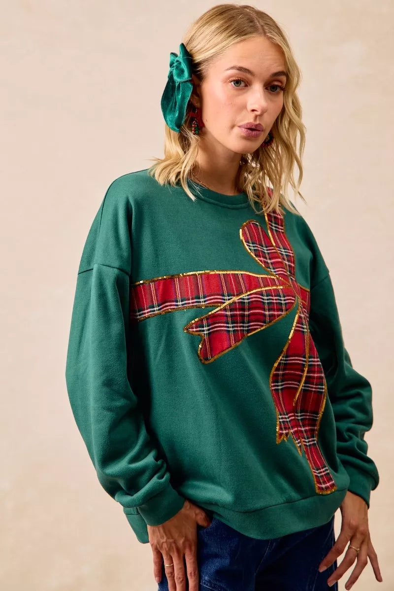 Pull en polaire de Noël BiBi avec nœud en ruban écossais
