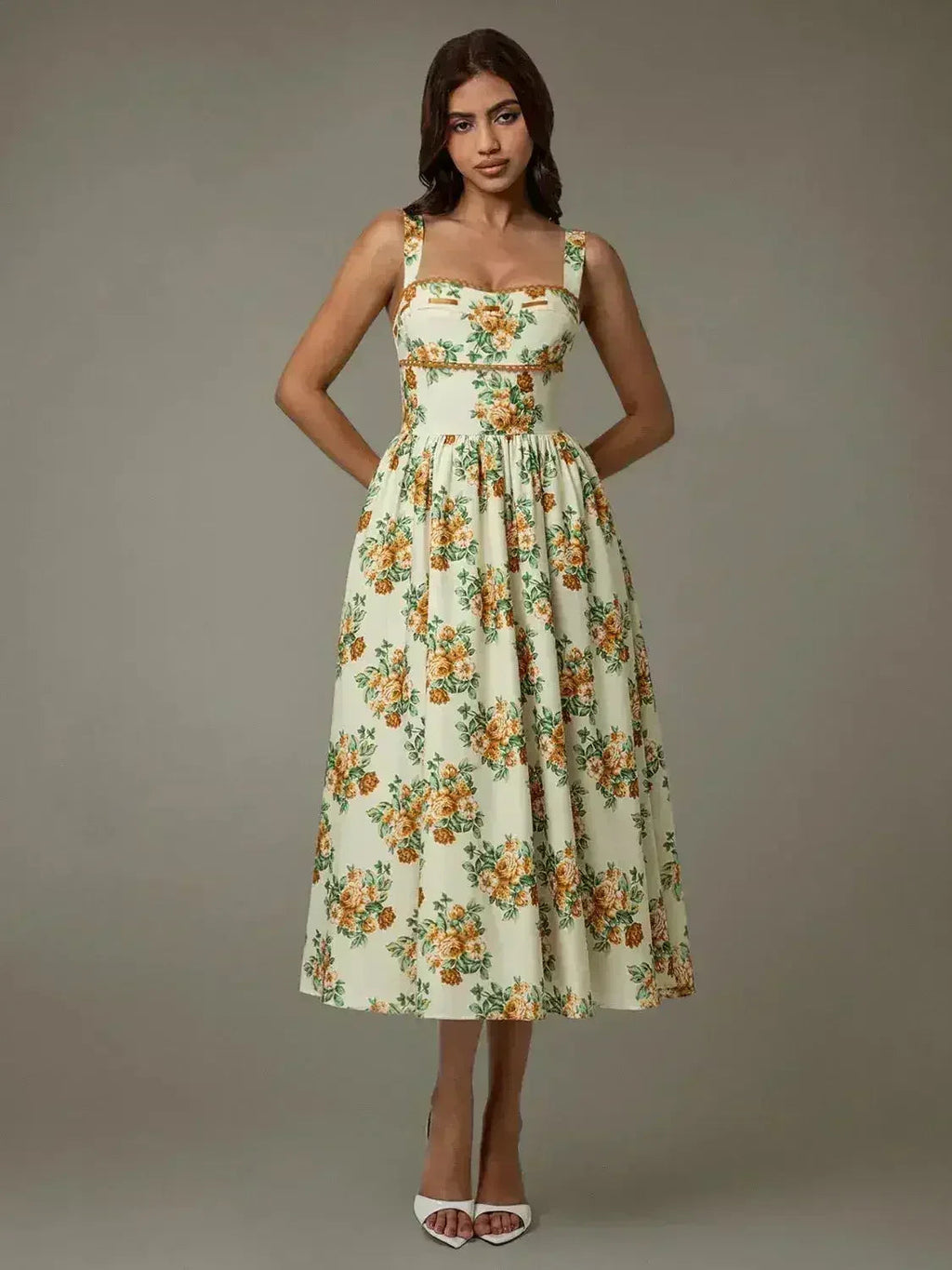 Robe midi florale sans manches bordée de dentelle