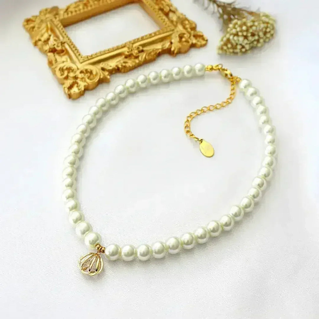 Ras de cou 24 carats en perles tchèques coquillages