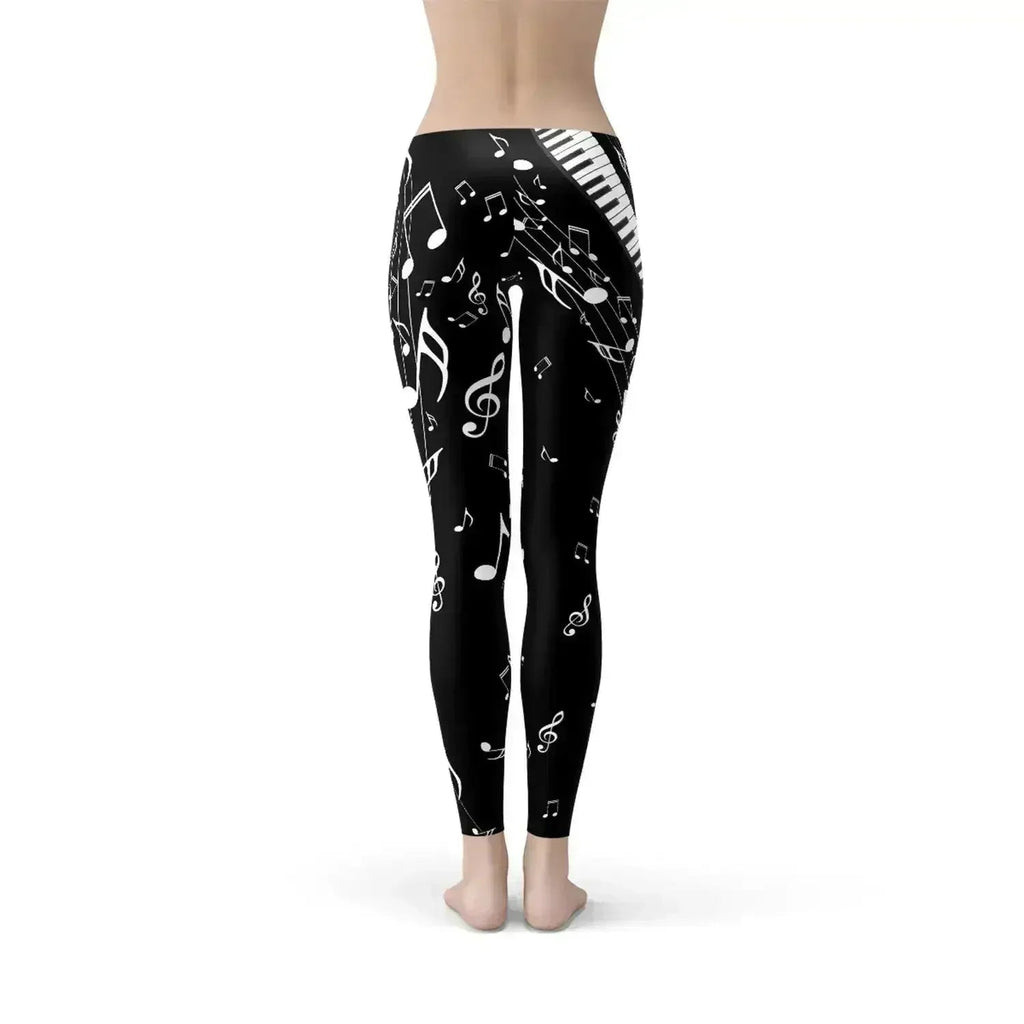 Legging noir motifs notes de piano femme
