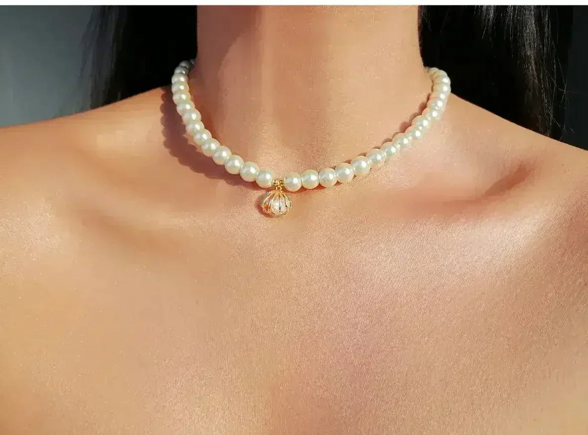 Ras de cou 24 carats en perles tchèques coquillages