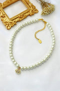 Ras de cou 24 carats en perles tchèques coquillages