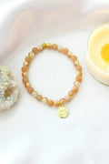 Bracelet élastique Pierre de soleil | Breloque Fleur de lotus 24K