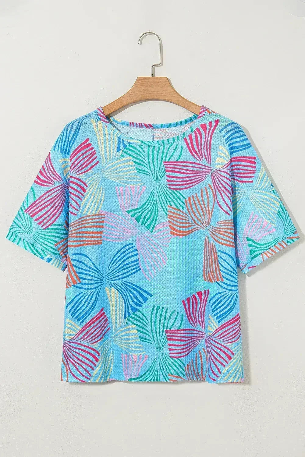 T-shirt ample gaufré bleu ciel à imprimé nœud papillon