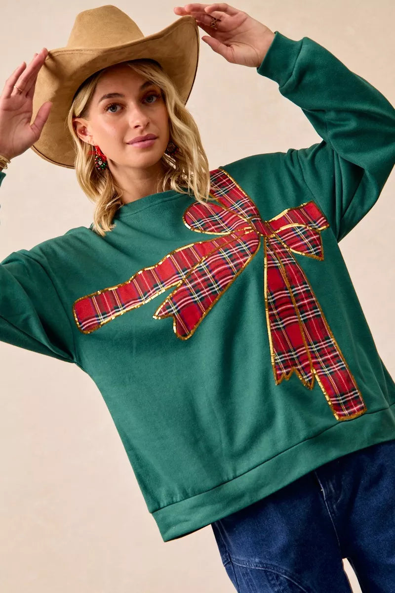 Pull en polaire de Noël BiBi avec nœud en ruban écossais