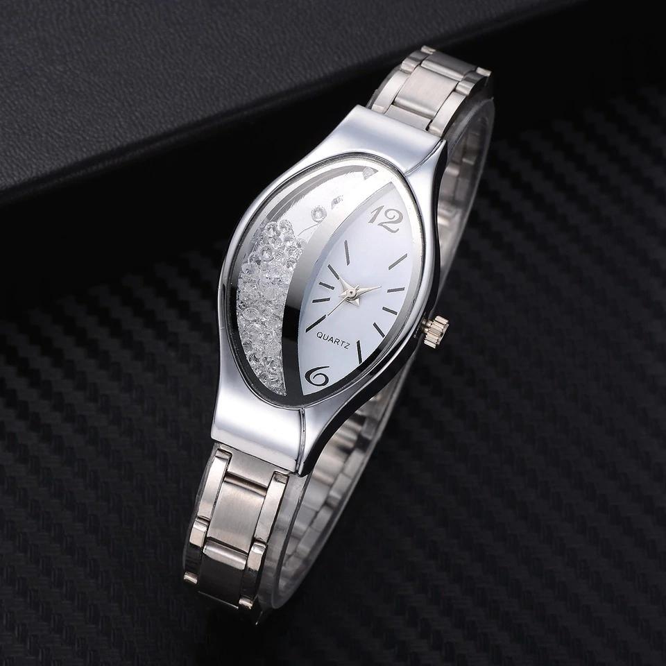 Montre de luxe Ellipse en PU à bracelet en cuir pour femmes, montre-bracelet à quartz sport en strass pour femmes et jeunes filles