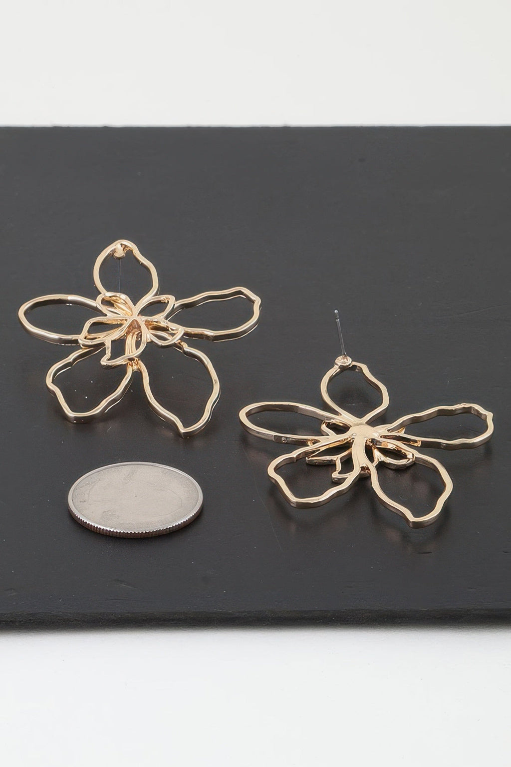 Boucles d'oreilles fleur abstraite délicate