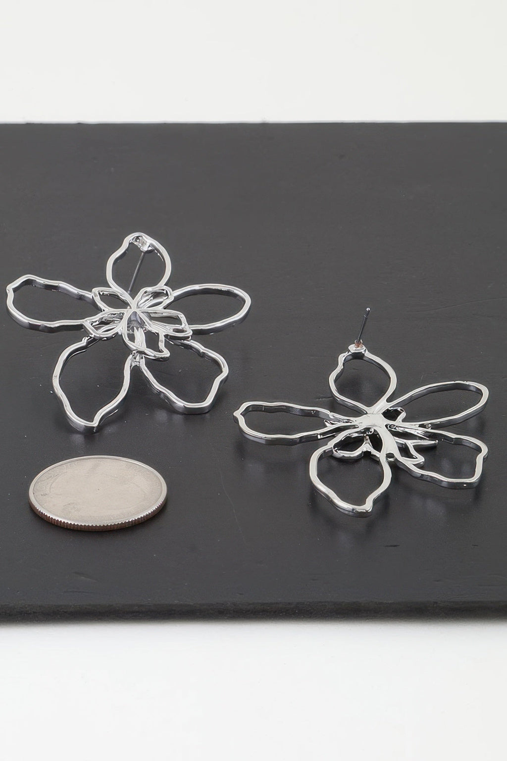 Boucles d'oreilles fleur abstraite délicate