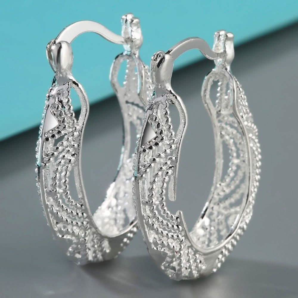 Boucles d'oreilles créoles fantaisie en filigrane taille diamant