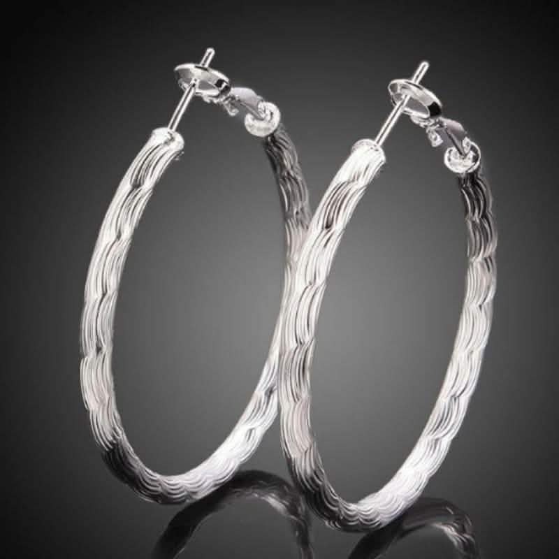 Créoles diamantées en or blanc