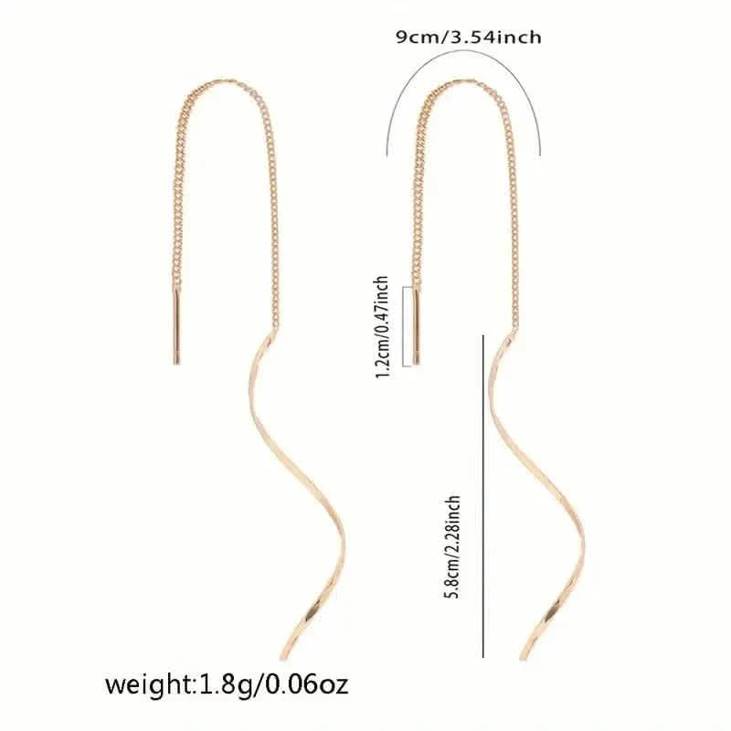 Boucles d'oreilles pendantes dorées motif S