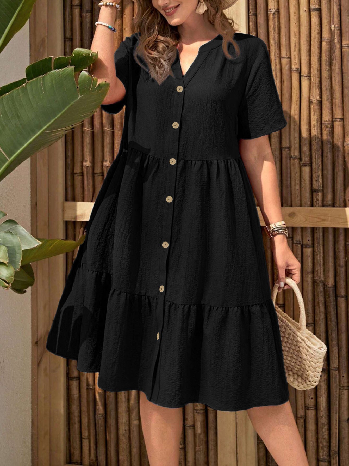 Robe mi-longue à col en V boutonnée grande taille