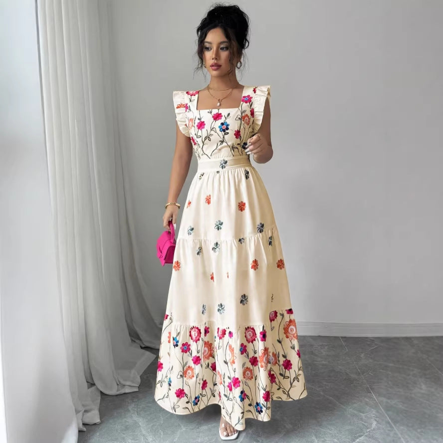 Robe fleurie à manches bouffantes et taille cintrée pour femme
