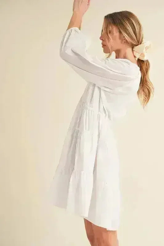 Mini-robe étagée à manches ballon entaillées Aemi + Co