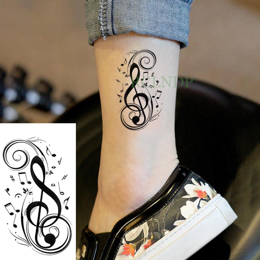 Tatouages autocollants temporaires imperméables "Notes de musique noires élégantes" pour hommes et femmes (poitrine et épaules)