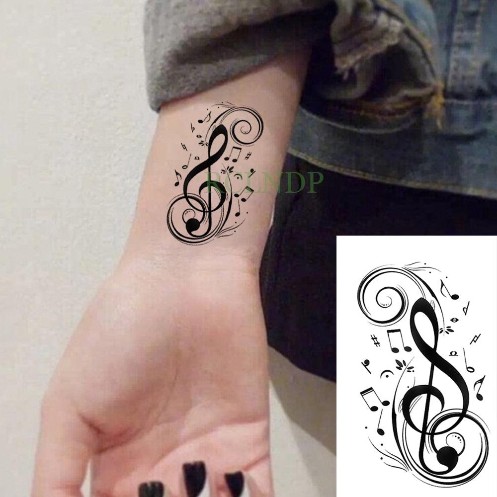 Tatouages autocollants temporaires imperméables "Notes de musique noires élégantes" pour hommes et femmes (poitrine et épaules)