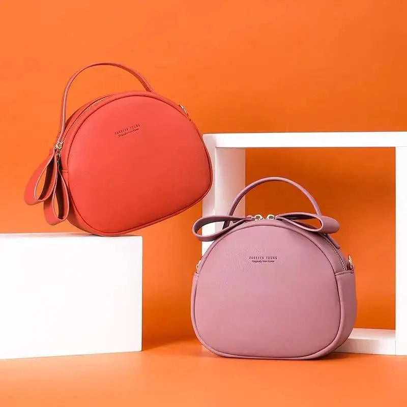 Sac à main femme élégant et mignon géométrique en cuir PU souple, sac bandoulière rond pour femme.