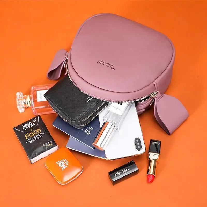 Sac à main femme élégant et mignon géométrique en cuir PU souple, sac bandoulière rond pour femme.