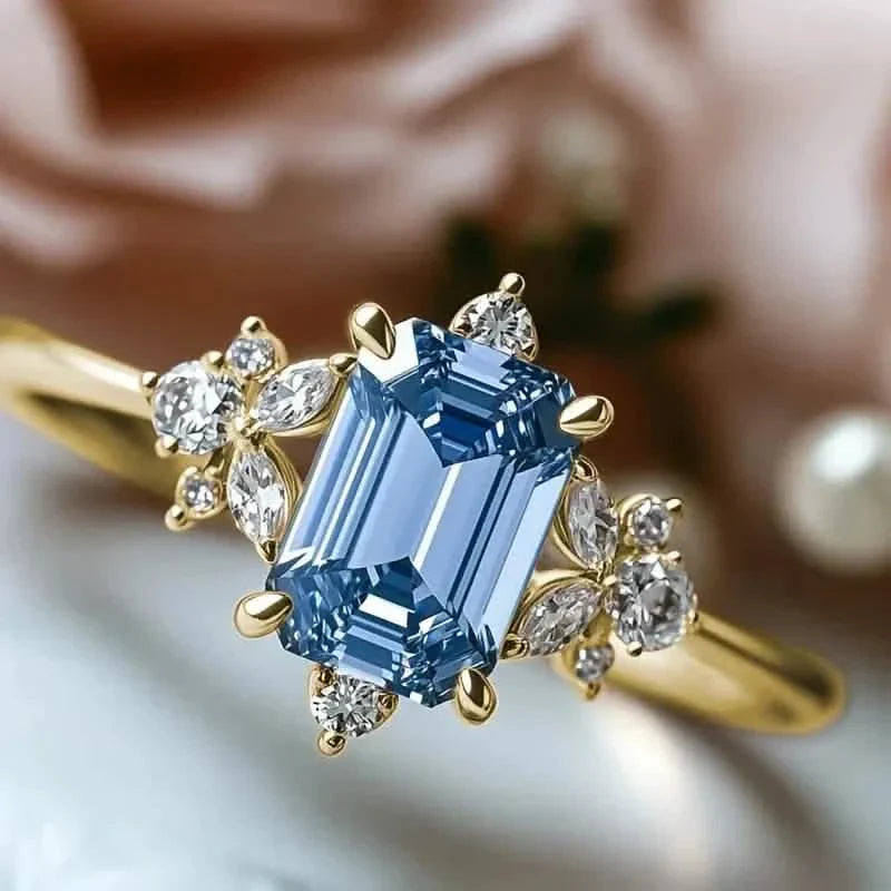 Élégante bague de fiançailles en cuivre plaqué or avec oxyde de zirconium bleu carré