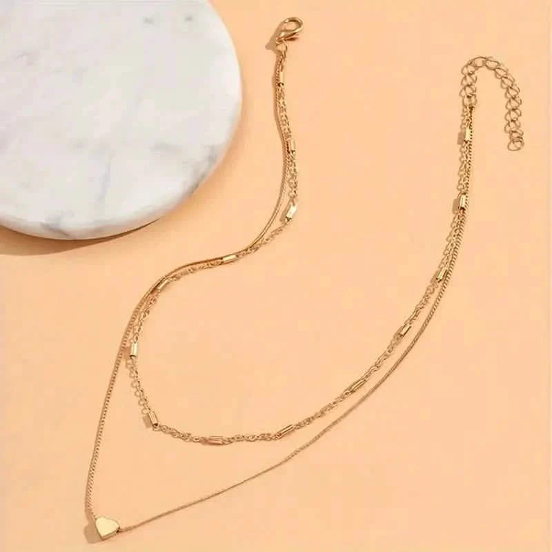 Élégant collier ras-de-cou double couche simple avec pendentif cœur