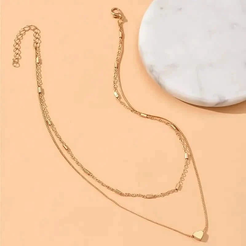 Élégant collier ras-de-cou double couche simple avec pendentif cœur