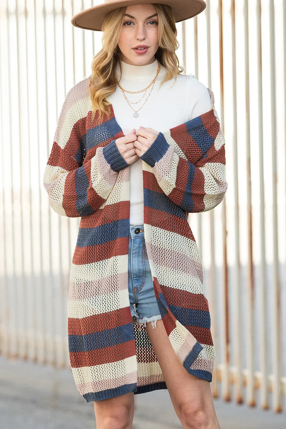 Gilet en maille rayé color block bleu foncé à découpes