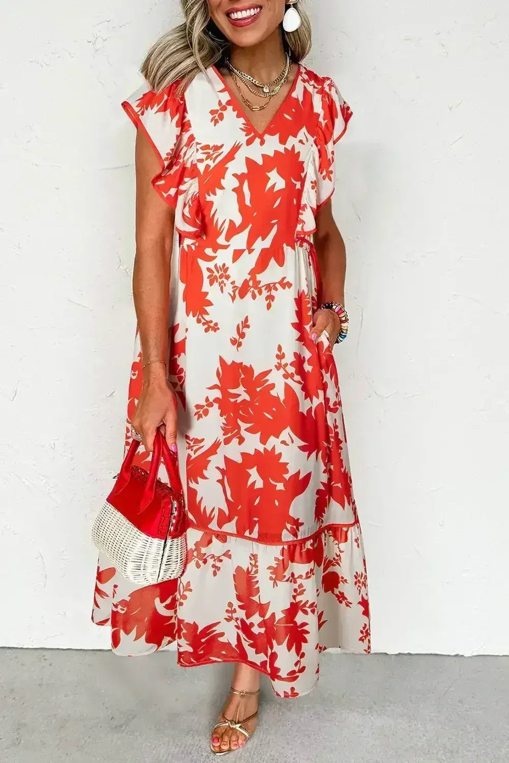 Robe longue rouge à imprimé floral, encolure en V et manches à volants