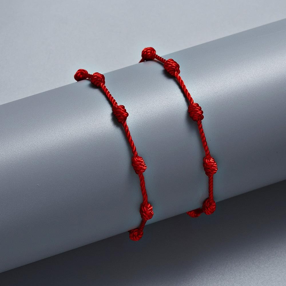 Bracelet fait main en ficelle rouge à 7 nœuds pour la protection, amulette porte-bonheur, bracelet d'amitié tressé, bracelet de protection porte-bonheur, amulette de protection, cadeau pour femmes, hommes et garçons