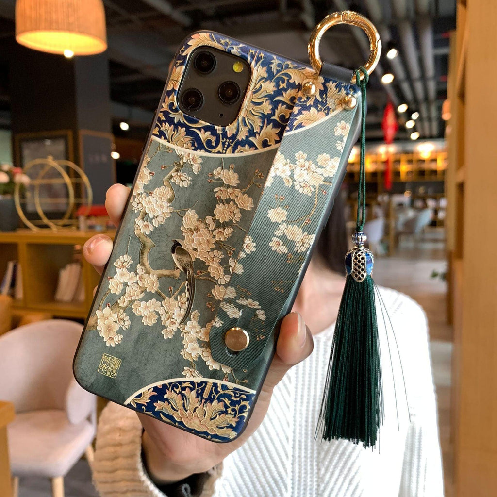 Coque de téléphone à motif floral tendance pour iPhone 11 12 13 14 Pro MAX X XS MAX XR 8 7 6 6s Plus X, étui souple avec dragonne et pompon, antichoc, coque arrière rigide, fine, protection intégrale, tendance, mignonne, élégante pour femme