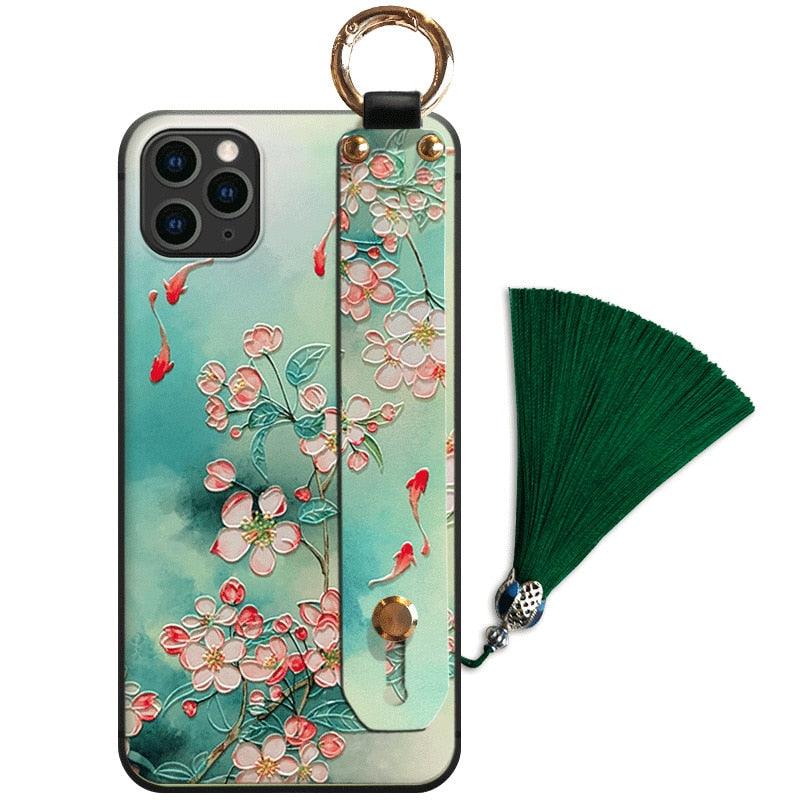 Coque de téléphone à motif floral tendance pour iPhone 11 12 13 14 Pro MAX X XS MAX XR 8 7 6 6s Plus X, étui souple avec dragonne et pompon, antichoc, coque arrière rigide, fine, protection intégrale, tendance, mignonne, élégante pour femme