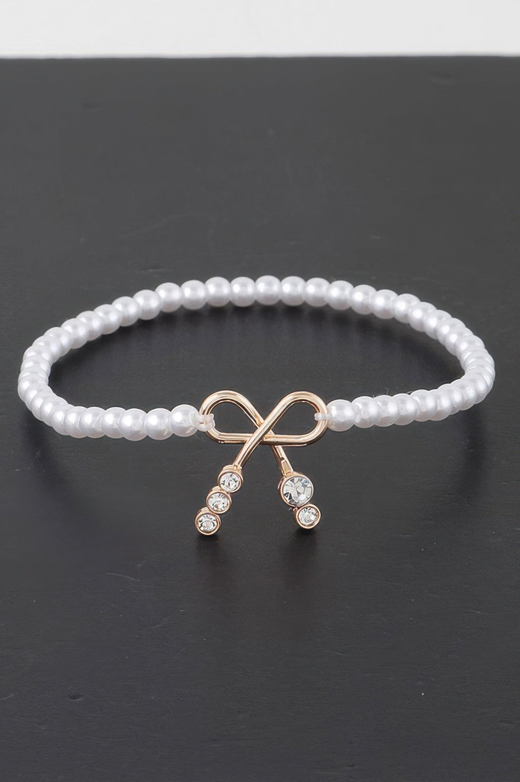 Bracelet de perles fantaisie avec nœud et strass